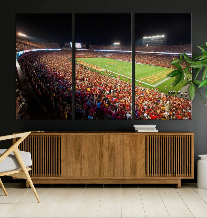 The Iowa State University Cyclones Football Team Print showcases a bustling Jack Trice Stadium in Ames, with the vibrant crowd in red attire enhancing its gallery-quality finish.