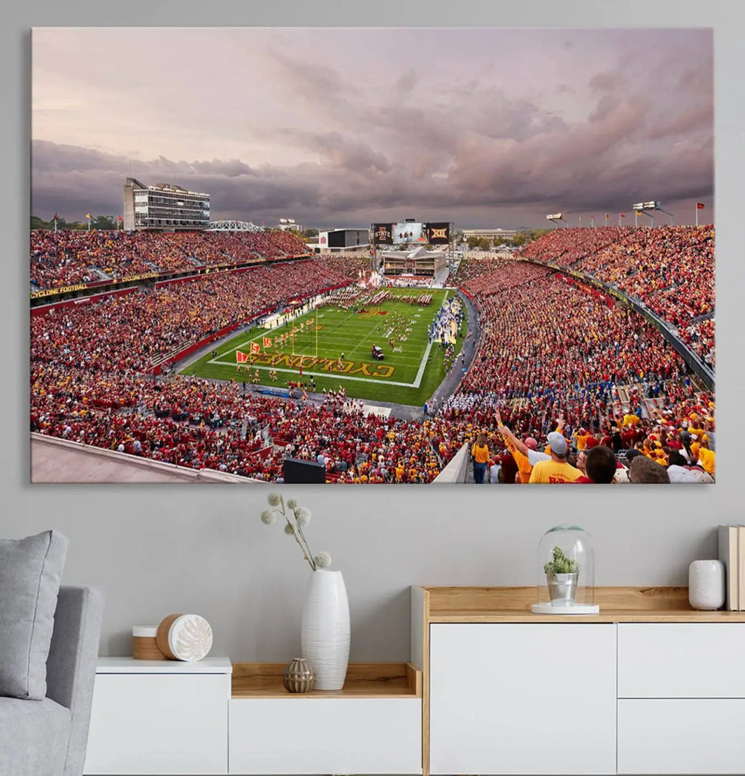 The living room features the "Iowa State University Cyclones Football Team Print - Ames Jack Trice Stadium Wall Art Canvas Print" on the wall, showcasing a packed football stadium in a gallery-quality finish.