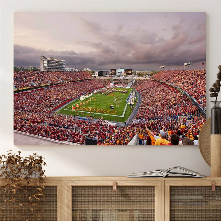 The living room features the "Iowa State University Cyclones Football Team Print - Ames Jack Trice Stadium Wall Art Canvas Print" on the wall, showcasing a packed football stadium in a gallery-quality finish.