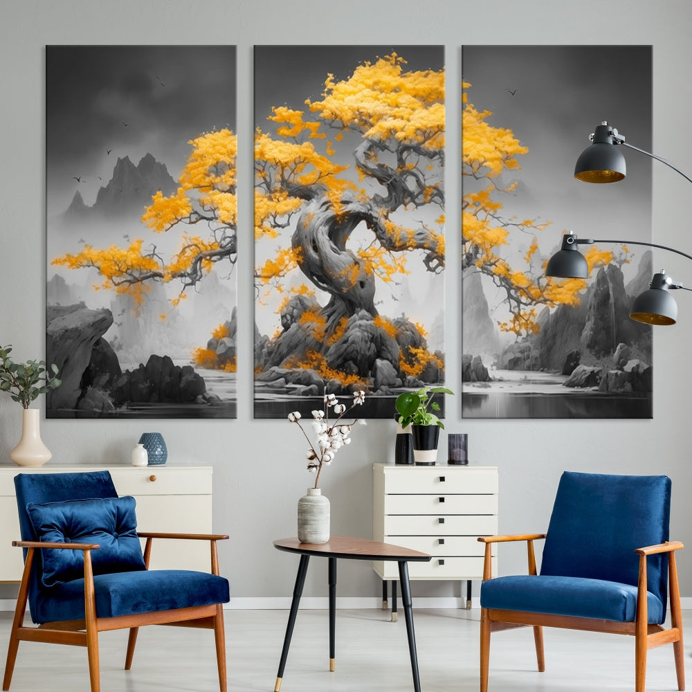 A Japanese Abstract Tree Wall Art Canvas Print showcases a vibrant yellow tree set against a misty, monochrome landscape. Each piece is gallery wrapped for lasting elegance.