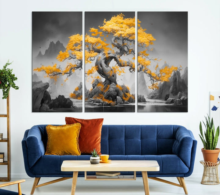 A Japanese Abstract Tree Wall Art Canvas Print showcases a vibrant yellow tree set against a misty, monochrome landscape. Each piece is gallery wrapped for lasting elegance.