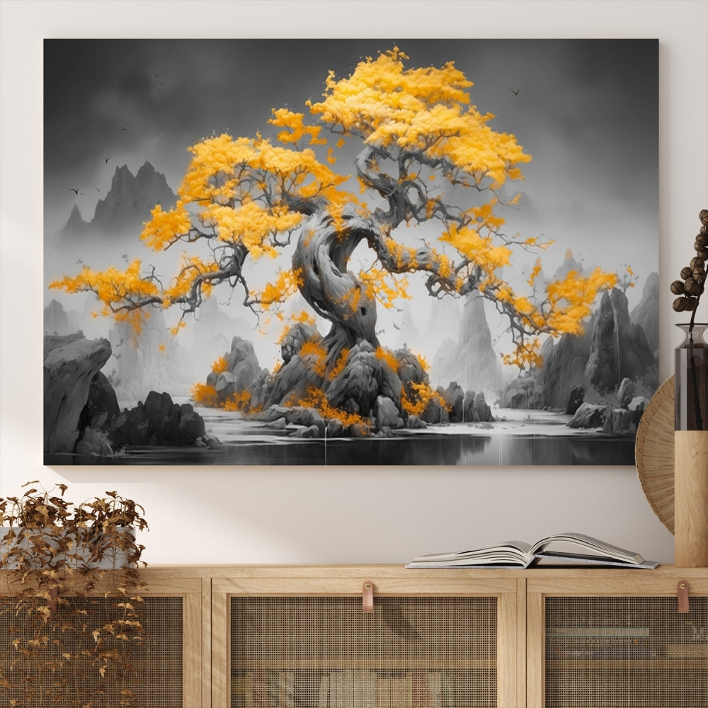 A Japanese Abstract Tree Wall Art Canvas Print showcases a vibrant yellow tree set against a misty, monochrome landscape. Each piece is gallery wrapped for lasting elegance.