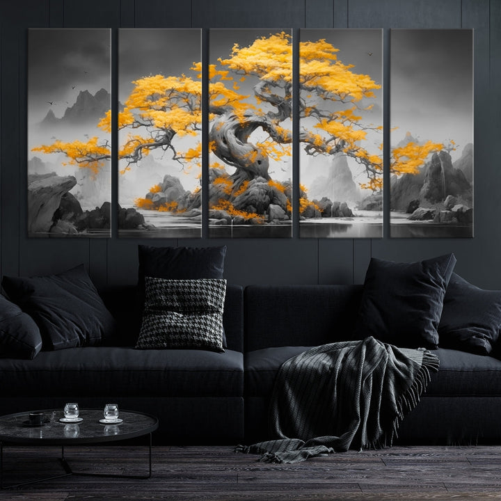 A Japanese Abstract Tree Wall Art Canvas Print showcases a vibrant yellow tree set against a misty, monochrome landscape. Each piece is gallery wrapped for lasting elegance.