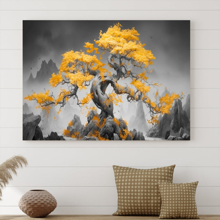 A Japanese Abstract Tree Wall Art Canvas Print showcases a vibrant yellow tree set against a misty, monochrome landscape. Each piece is gallery wrapped for lasting elegance.