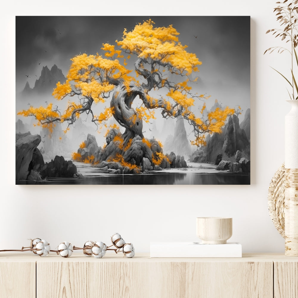 A Japanese Abstract Tree Wall Art Canvas Print showcases a vibrant yellow tree set against a misty, monochrome landscape. Each piece is gallery wrapped for lasting elegance.