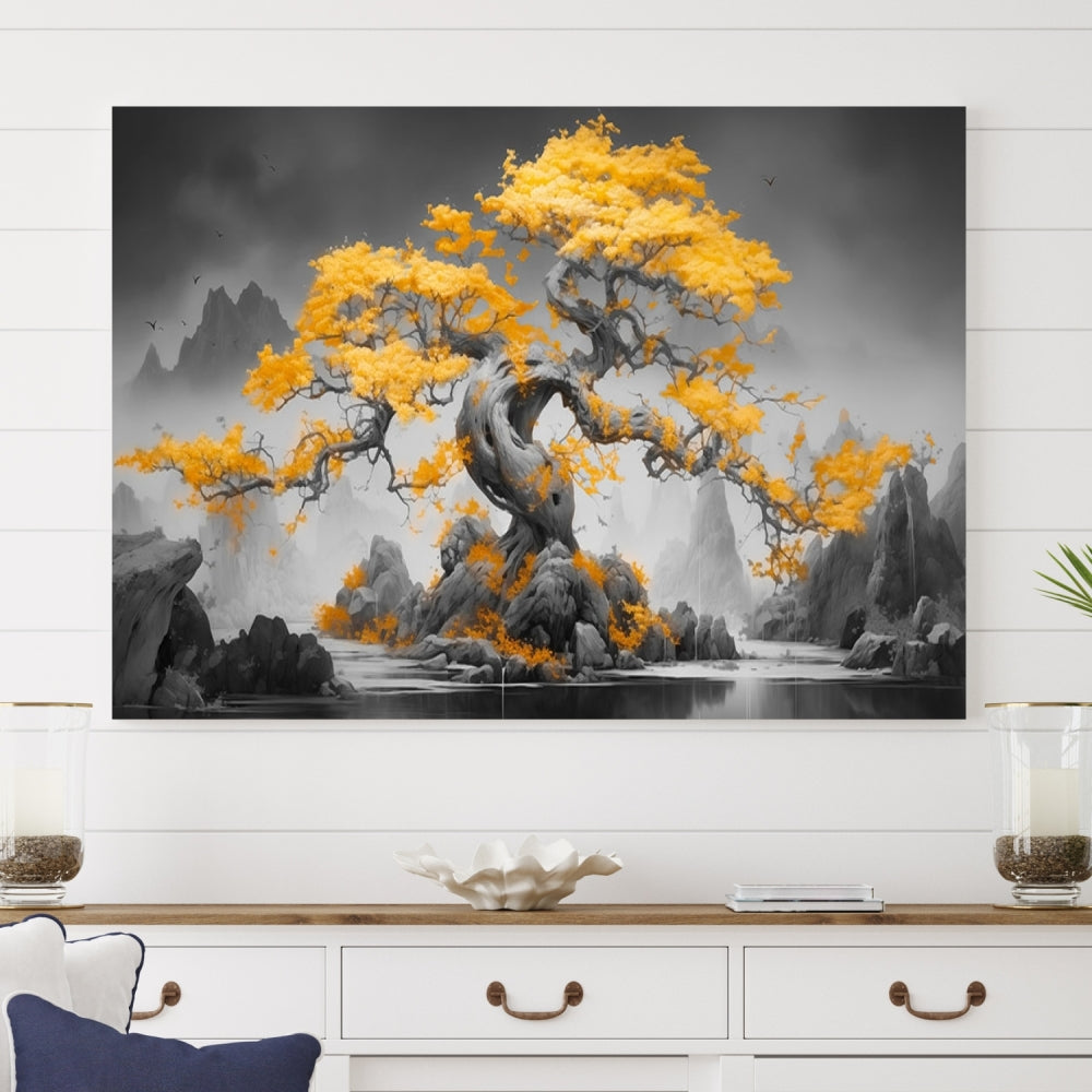 A Japanese Abstract Tree Wall Art Canvas Print showcases a vibrant yellow tree set against a misty, monochrome landscape. Each piece is gallery wrapped for lasting elegance.