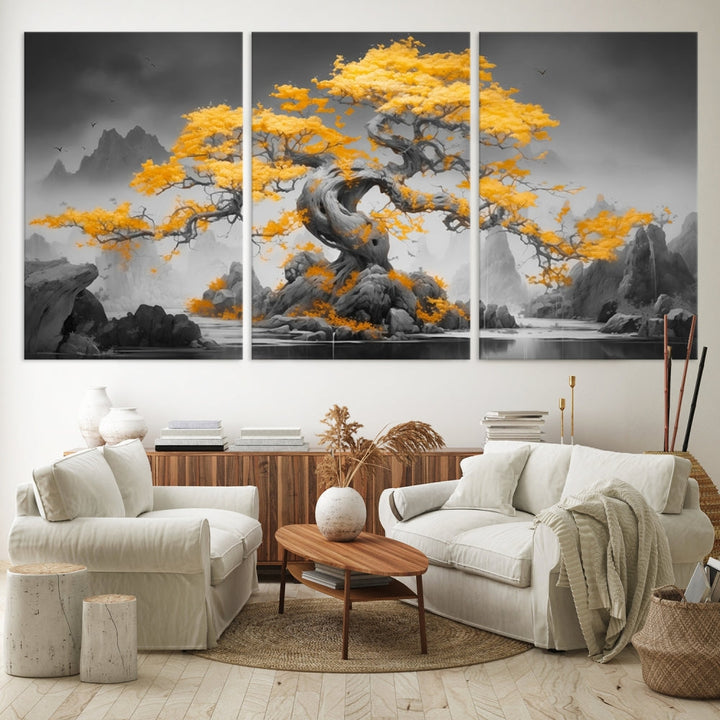 A Japanese Abstract Tree Wall Art Canvas Print showcases a vibrant yellow tree set against a misty, monochrome landscape. Each piece is gallery wrapped for lasting elegance.