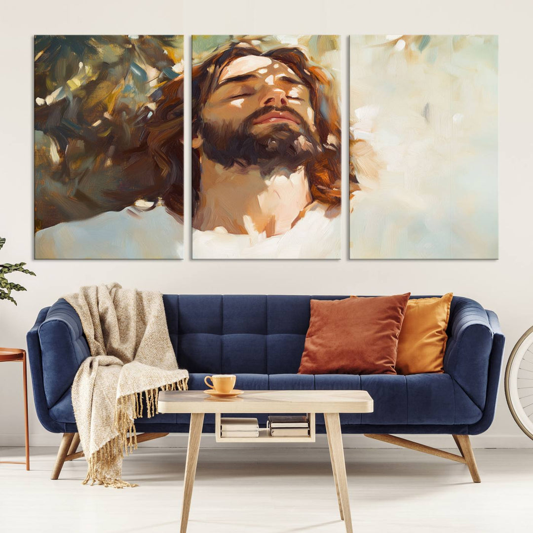 The Jesus Portrait Wall Art Canvas Print features a depiction of Jesus Christ with closed eyes, basking in sunlight. His expression exudes a peaceful, spiritual atmosphere against a blurred background.