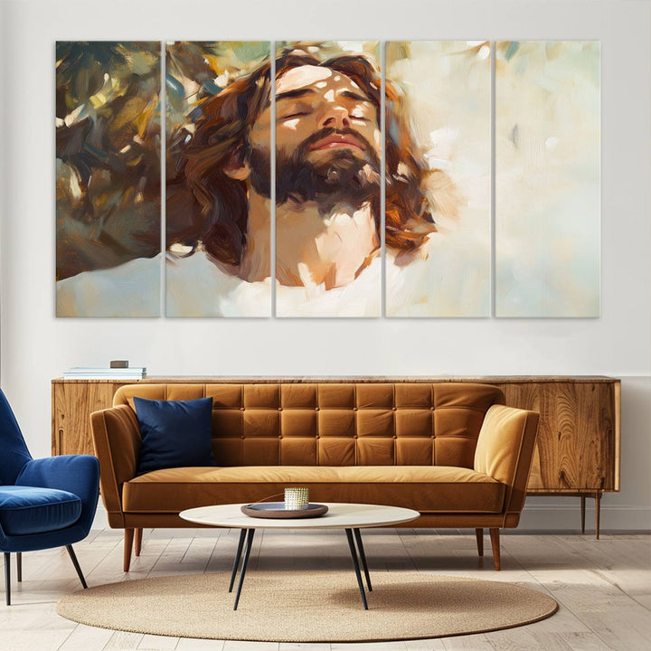 The Jesus Portrait Wall Art Canvas Print features a depiction of Jesus Christ with closed eyes, basking in sunlight. His expression exudes a peaceful, spiritual atmosphere against a blurred background.