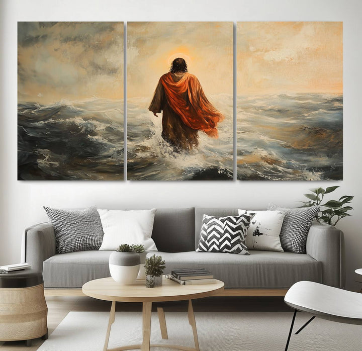 This triptych wall art, titled "Jesus Walking on Water," presents a figure in a red cloak crossing turbulent seas. It is perfect for those looking for religious home decor with a contemporary flair.