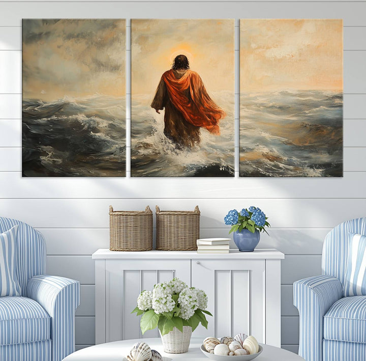 This triptych wall art, titled "Jesus Walking on Water," presents a figure in a red cloak crossing turbulent seas. It is perfect for those looking for religious home decor with a contemporary flair.