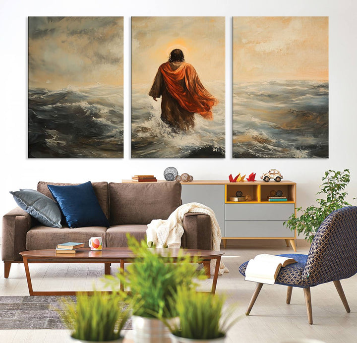 This triptych wall art, titled "Jesus Walking on Water," presents a figure in a red cloak crossing turbulent seas. It is perfect for those looking for religious home decor with a contemporary flair.