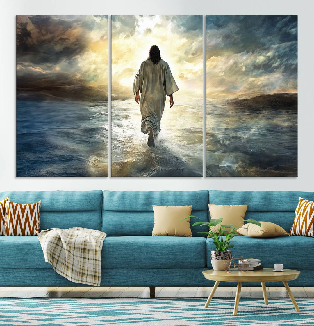 The Jesus Walking on Water Wall Art, a captivating triptych canvas print, showcases a person walking on water beneath dramatic clouds. This ready-to-hang piece seamlessly combines faith and style for your Christian home decor.