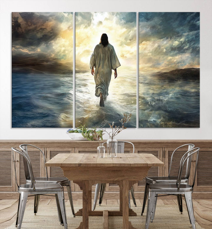 The Jesus Walking on Water Wall Art, a captivating triptych canvas print, showcases a person walking on water beneath dramatic clouds. This ready-to-hang piece seamlessly combines faith and style for your Christian home decor.