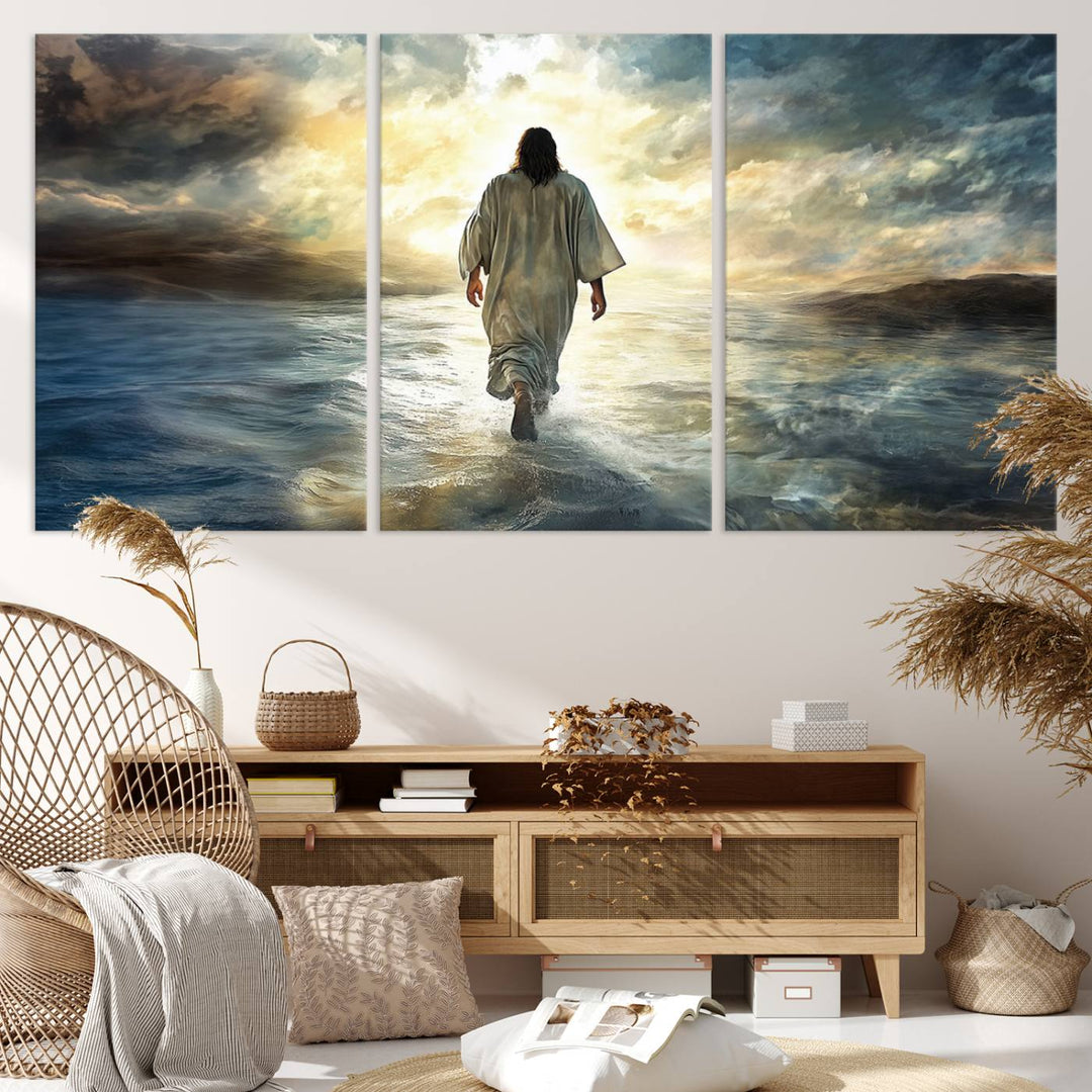 The Jesus Walking on Water Wall Art, a captivating triptych canvas print, showcases a person walking on water beneath dramatic clouds. This ready-to-hang piece seamlessly combines faith and style for your Christian home decor.