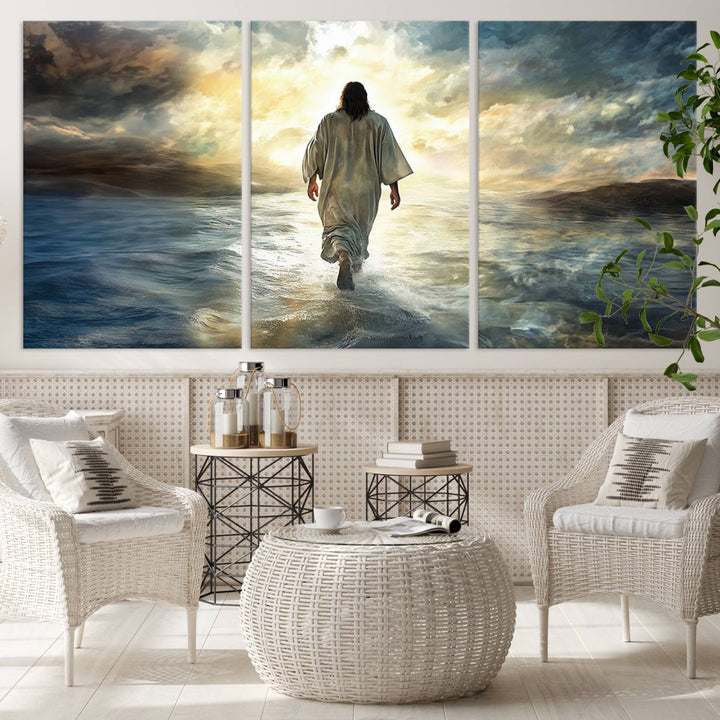 The Jesus Walking on Water Wall Art, a captivating triptych canvas print, showcases a person walking on water beneath dramatic clouds. This ready-to-hang piece seamlessly combines faith and style for your Christian home decor.