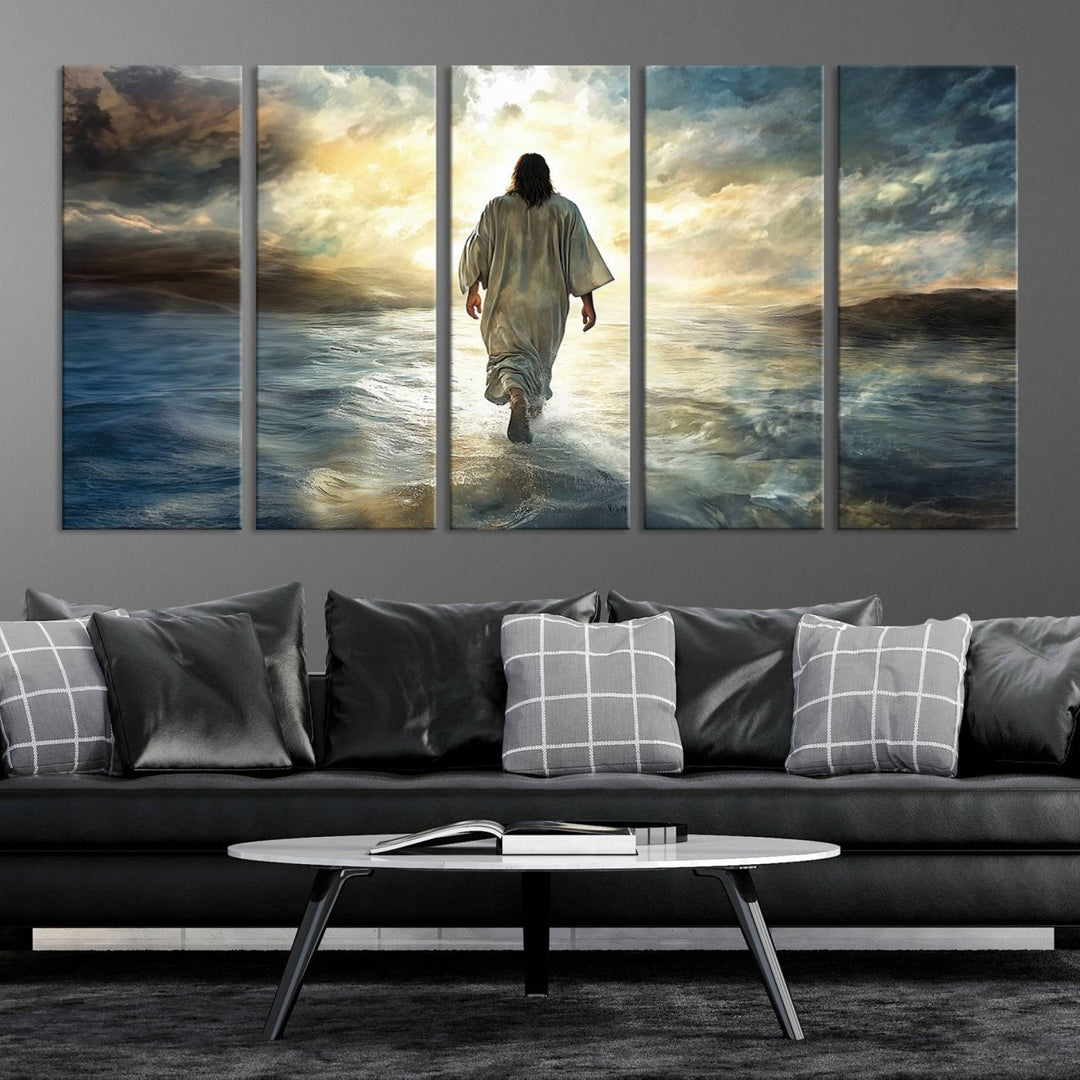 The Jesus Walking on Water Wall Art, a captivating triptych canvas print, showcases a person walking on water beneath dramatic clouds. This ready-to-hang piece seamlessly combines faith and style for your Christian home decor.