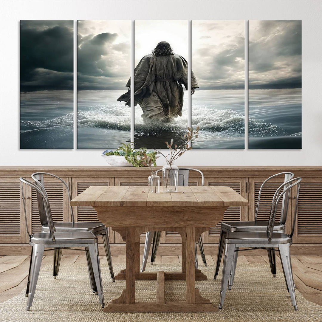 The Jesus Walking on Water Wall Art beautifully depicts a robed figure amidst clouds. This ready-to-hang canvas print enhances any space with its Christian motif, adding a touch of religious elegance and inspiration.