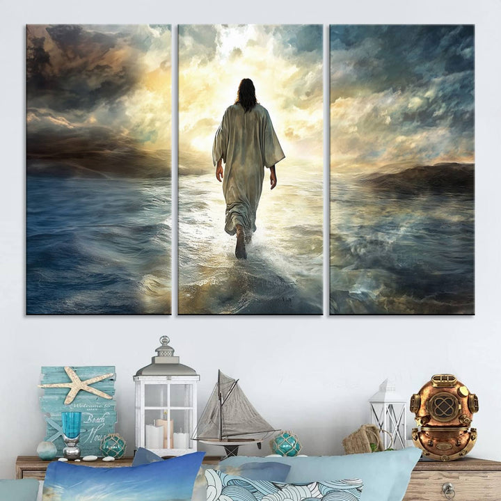 The Jesus Walking on Water Wall Art, a captivating triptych canvas print, showcases a person walking on water beneath dramatic clouds. This ready-to-hang piece seamlessly combines faith and style for your Christian home decor.