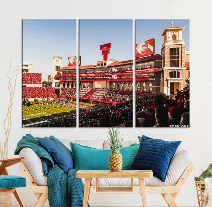 A 3-panel large canvas print of the Jones AT&T Stadium, showcasing vibrant Texas Tech Red Raiders fans in red and white, is elegantly displayed.