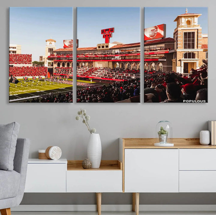 A 3-panel large canvas print of the Jones AT&T Stadium, showcasing vibrant Texas Tech Red Raiders fans in red and white, is elegantly displayed.