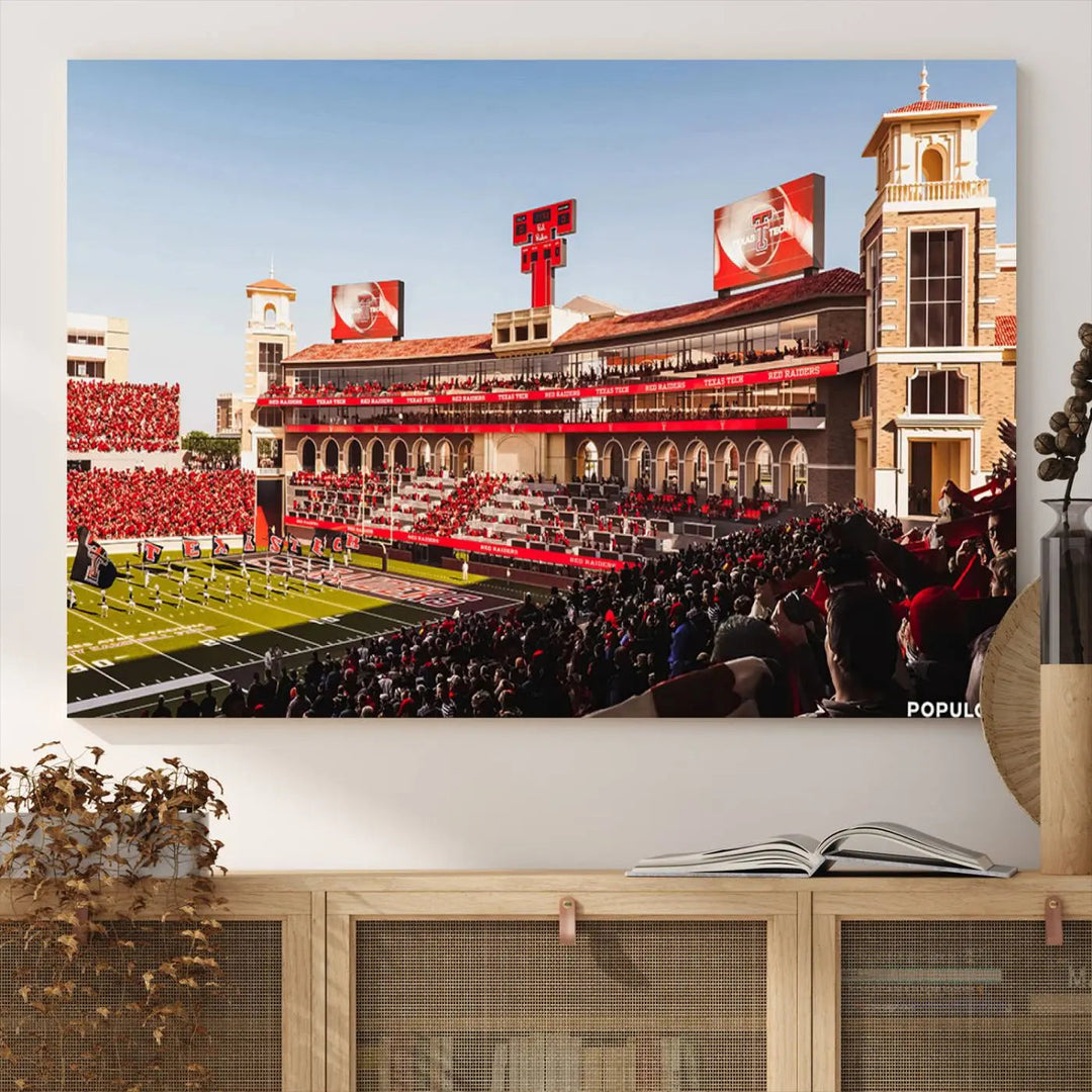 A 3-panel large canvas print of the Jones AT&T Stadium, showcasing vibrant Texas Tech Red Raiders fans in red and white, is elegantly displayed.