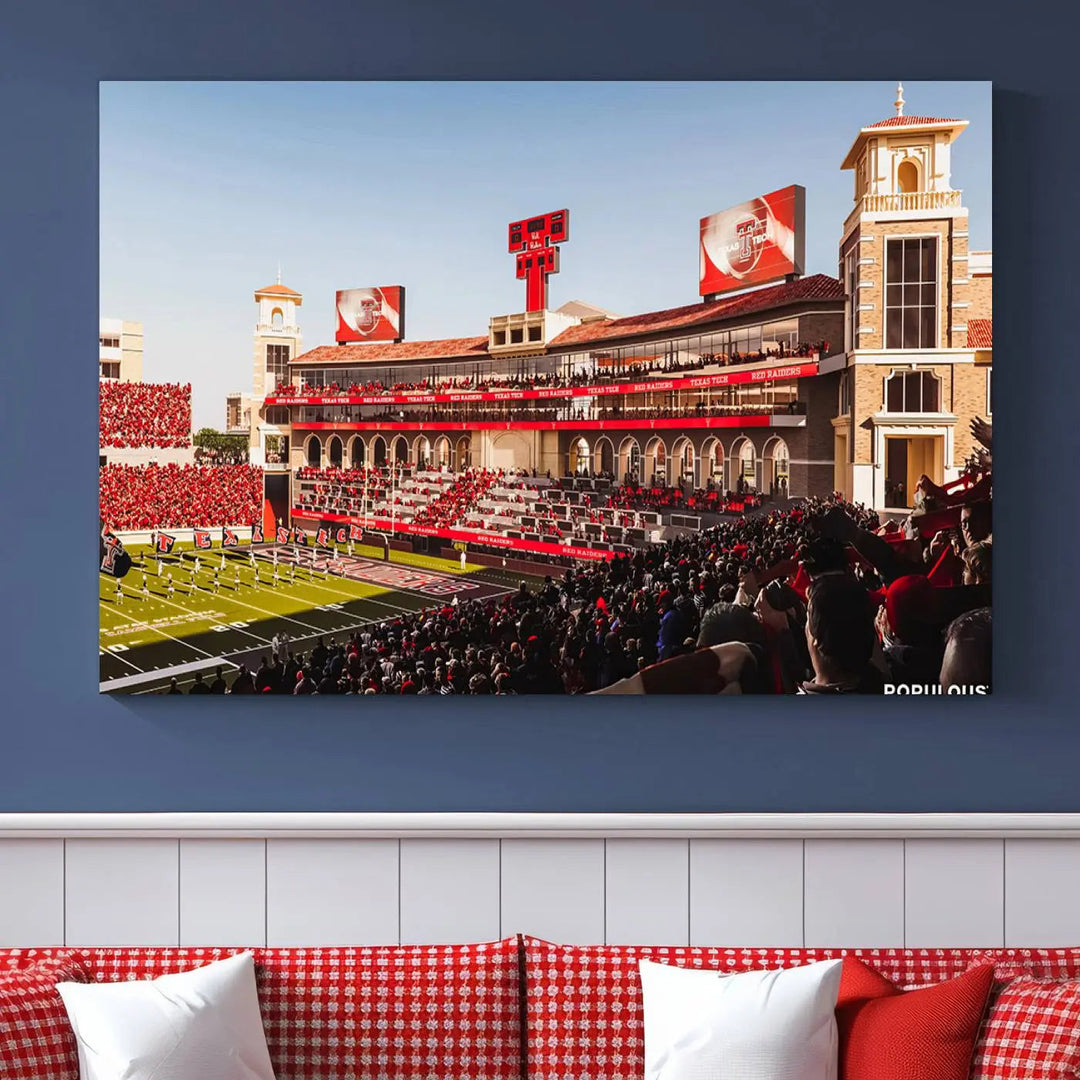 A 3-panel large canvas print of the Jones AT&T Stadium, showcasing vibrant Texas Tech Red Raiders fans in red and white, is elegantly displayed.