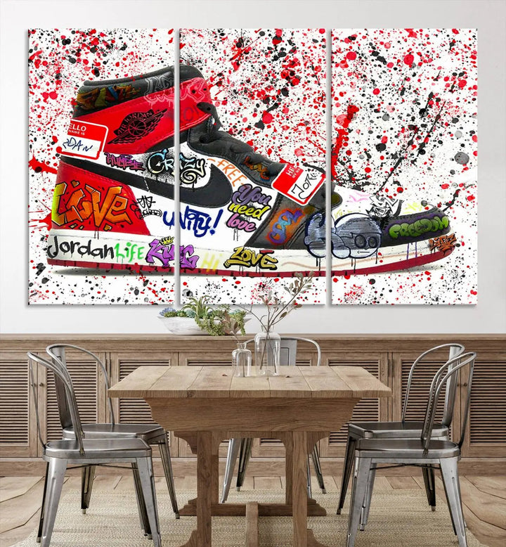 A large triptych mural titled "Jordan Shoes Graffiti Wall Art Canvas Print - Jordan Graffiti Canvas Wall Art" features images of Jordan Shoes against a splattered paint background that resembles graffiti, making it an ideal choice for sneakerheads and urban art lovers.