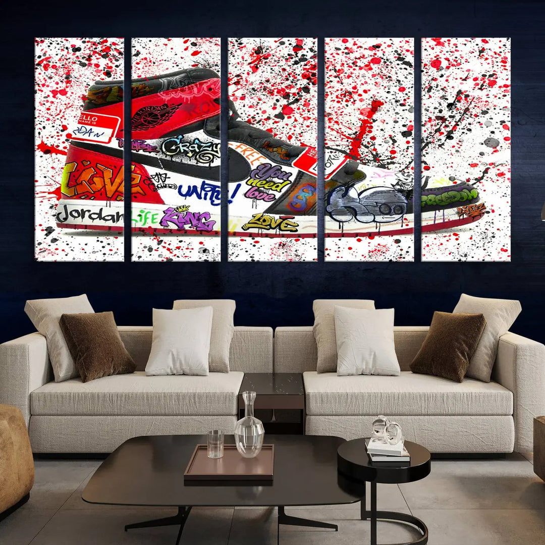 A large triptych mural titled "Jordan Shoes Graffiti Wall Art Canvas Print - Jordan Graffiti Canvas Wall Art" features images of Jordan Shoes against a splattered paint background that resembles graffiti, making it an ideal choice for sneakerheads and urban art lovers.