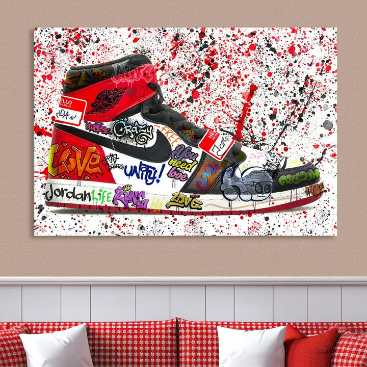 A large triptych mural titled "Jordan Shoes Graffiti Wall Art Canvas Print - Jordan Graffiti Canvas Wall Art" features images of Jordan Shoes against a splattered paint background that resembles graffiti, making it an ideal choice for sneakerheads and urban art lovers.