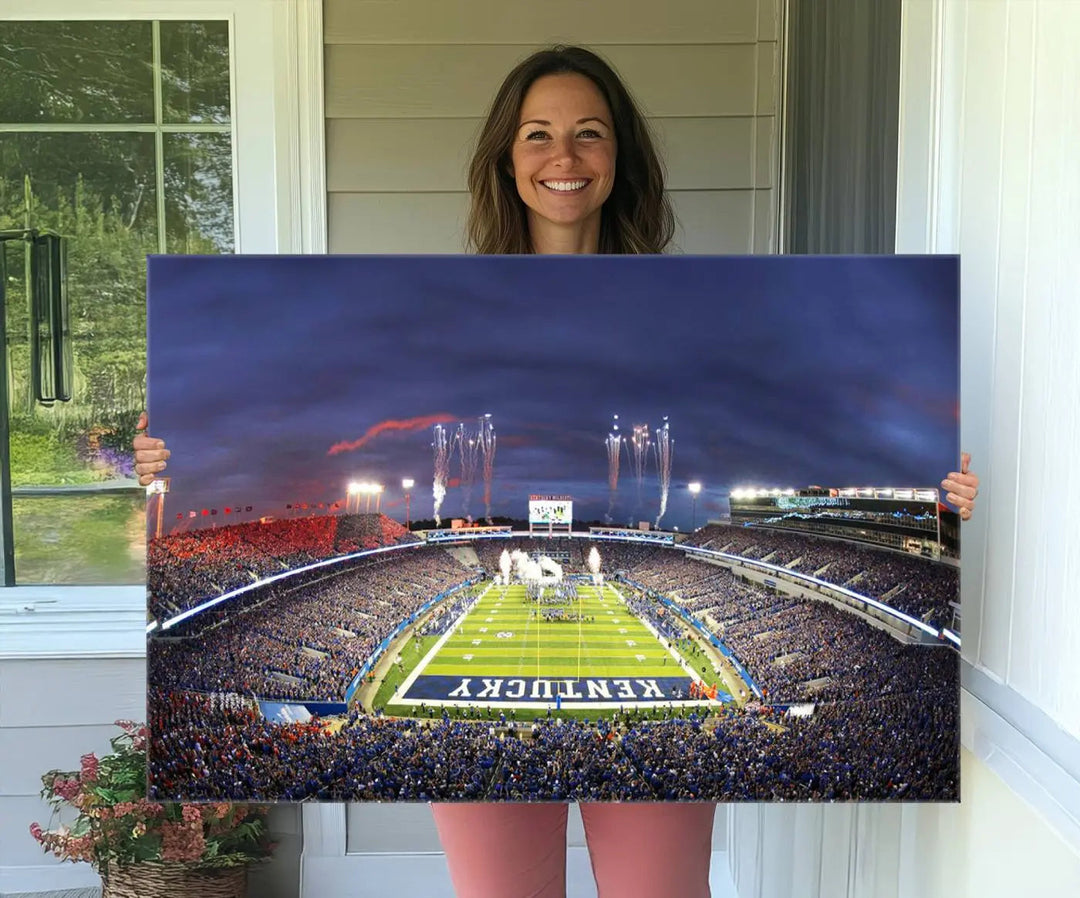 The Kroger Field Canvas Wall Art beautifully captures the thrill of a stadium filled with spectators during a football game, illuminated by fireworks in the evening sky. This handmade piece offers a gallery-quality finish on premium canvas, making it an ideal addition to your home or office.