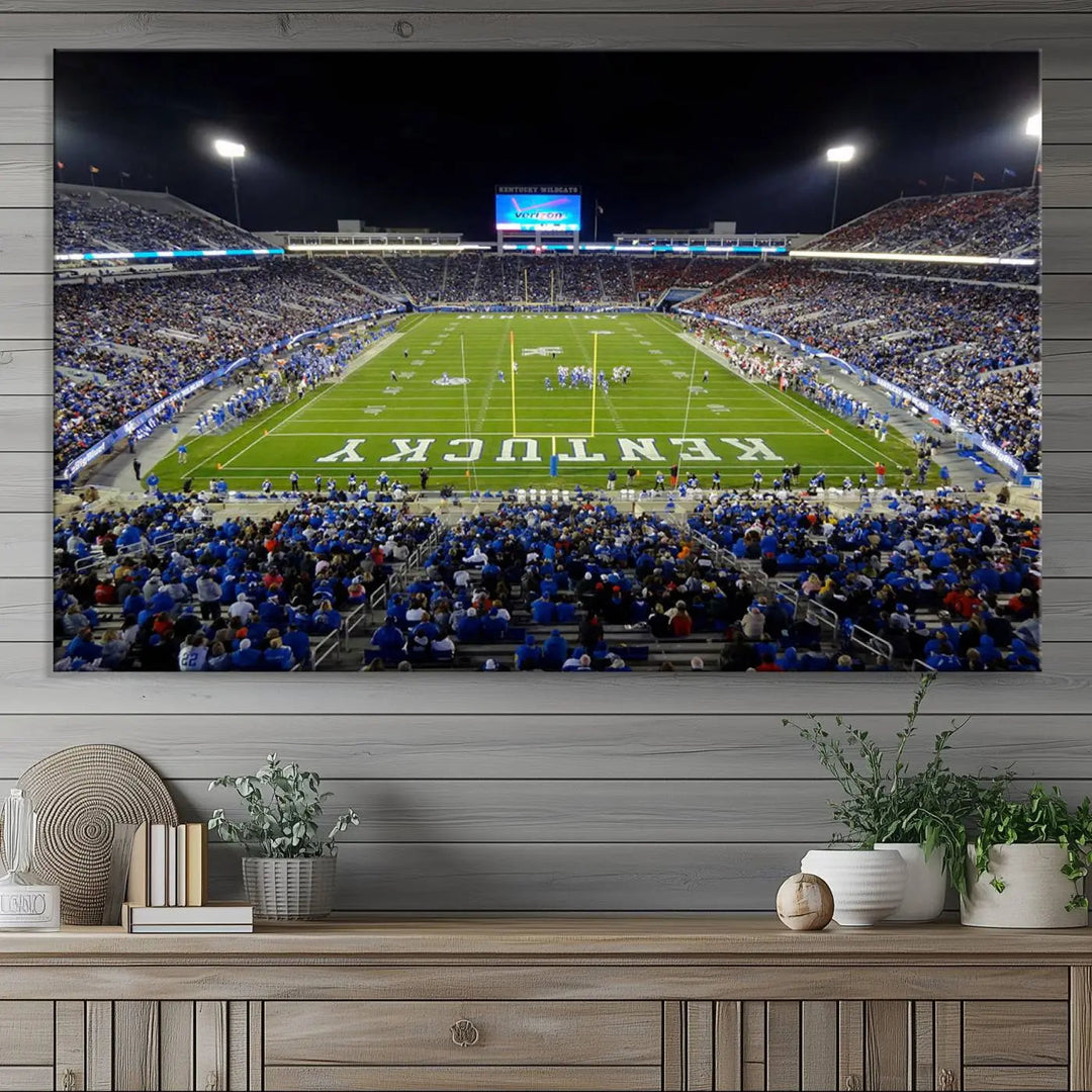 A sunset football game at Kroger Field in Lexington, with Kentucky showcased on the field, transforms into a stunning wall art piece. This premium canvas artwork, handmade in the USA, vividly encapsulates the vibrant energy and excitement of this memorable sports moment.