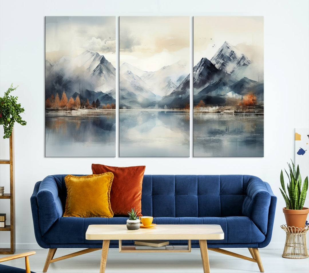 The Lake Mountain Abstract Wall Art, featuring a serene portrayal of mountains and a tranquil lake with autumn trees, is displayed on museum-quality canvas and enhanced by UV-protective coating.