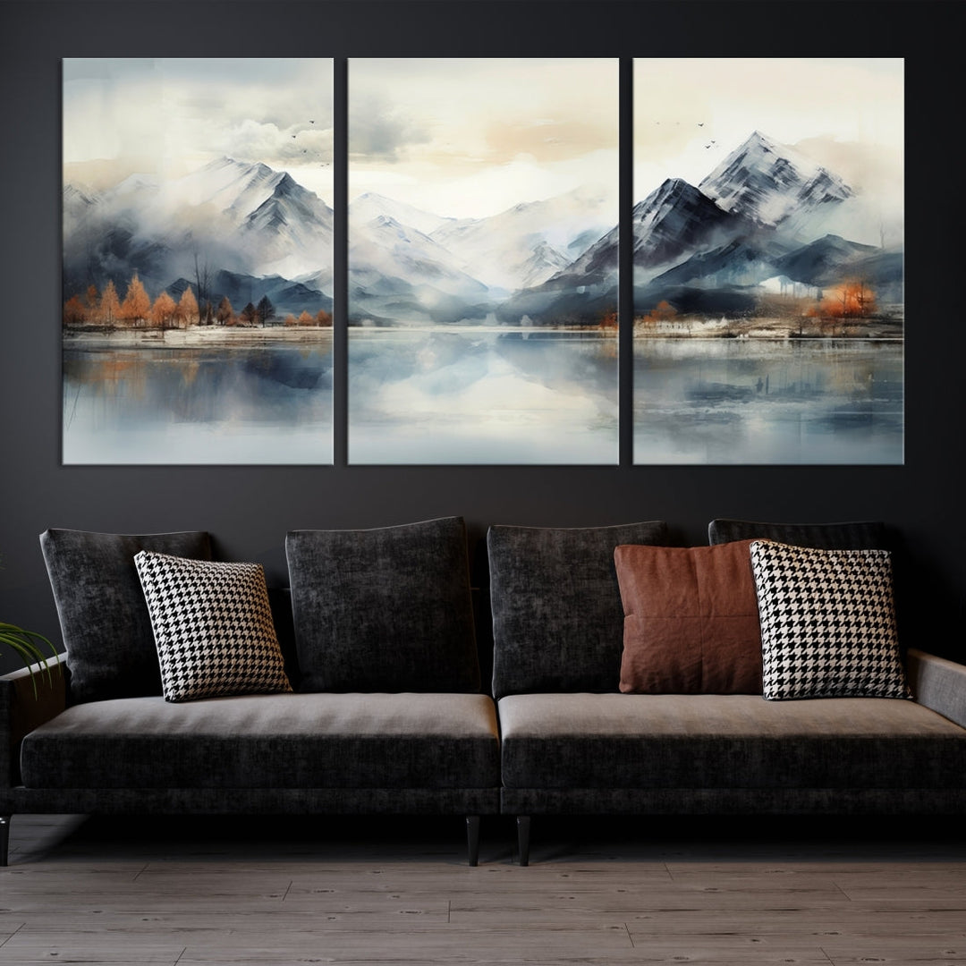 The Lake Mountain Abstract Wall Art, featuring a serene portrayal of mountains and a tranquil lake with autumn trees, is displayed on museum-quality canvas and enhanced by UV-protective coating.