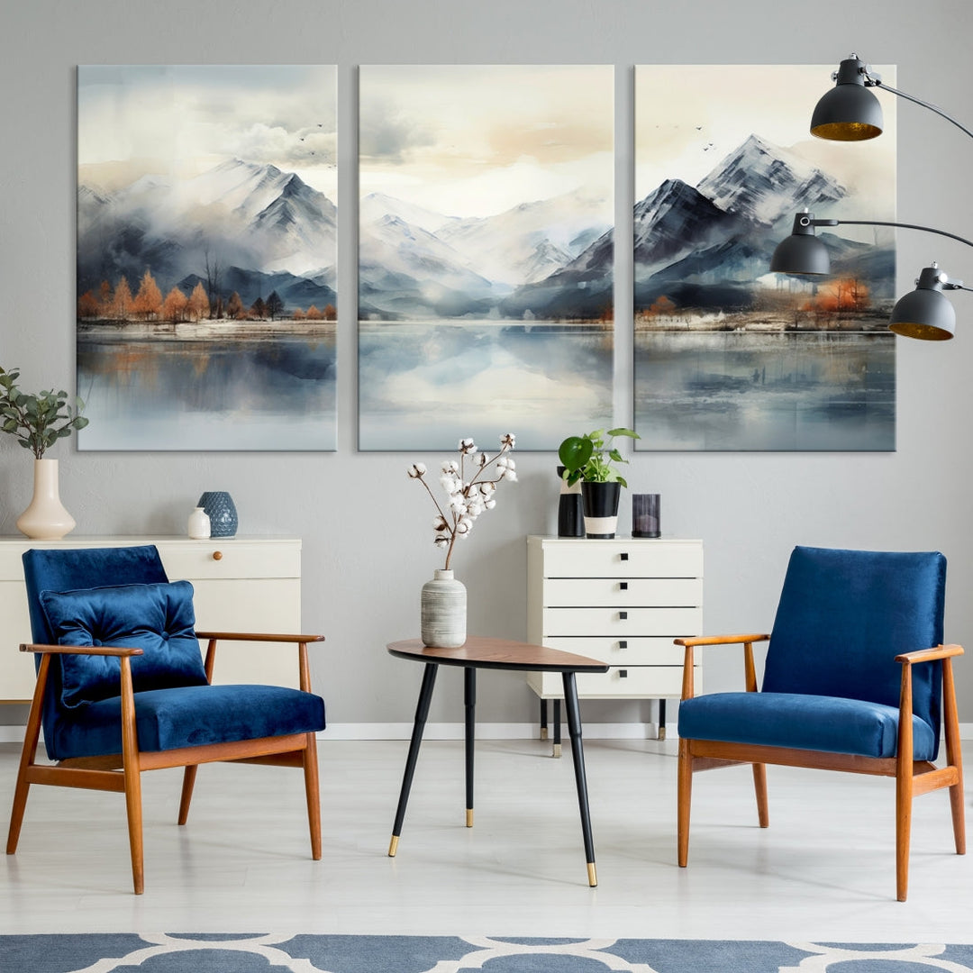 The Lake Mountain Abstract Wall Art, featuring a serene portrayal of mountains and a tranquil lake with autumn trees, is displayed on museum-quality canvas and enhanced by UV-protective coating.