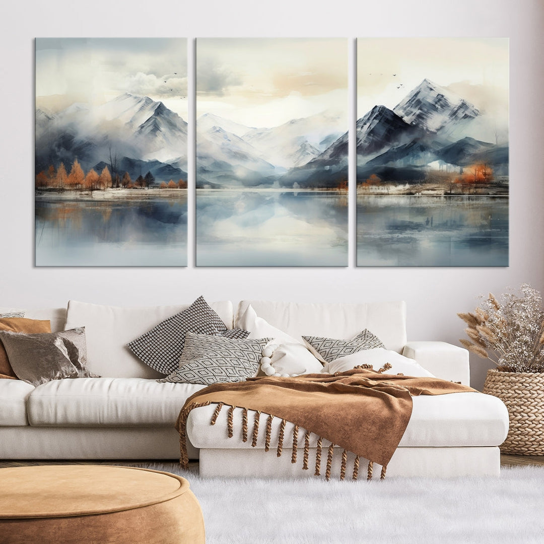 The Lake Mountain Abstract Wall Art, featuring a serene portrayal of mountains and a tranquil lake with autumn trees, is displayed on museum-quality canvas and enhanced by UV-protective coating.