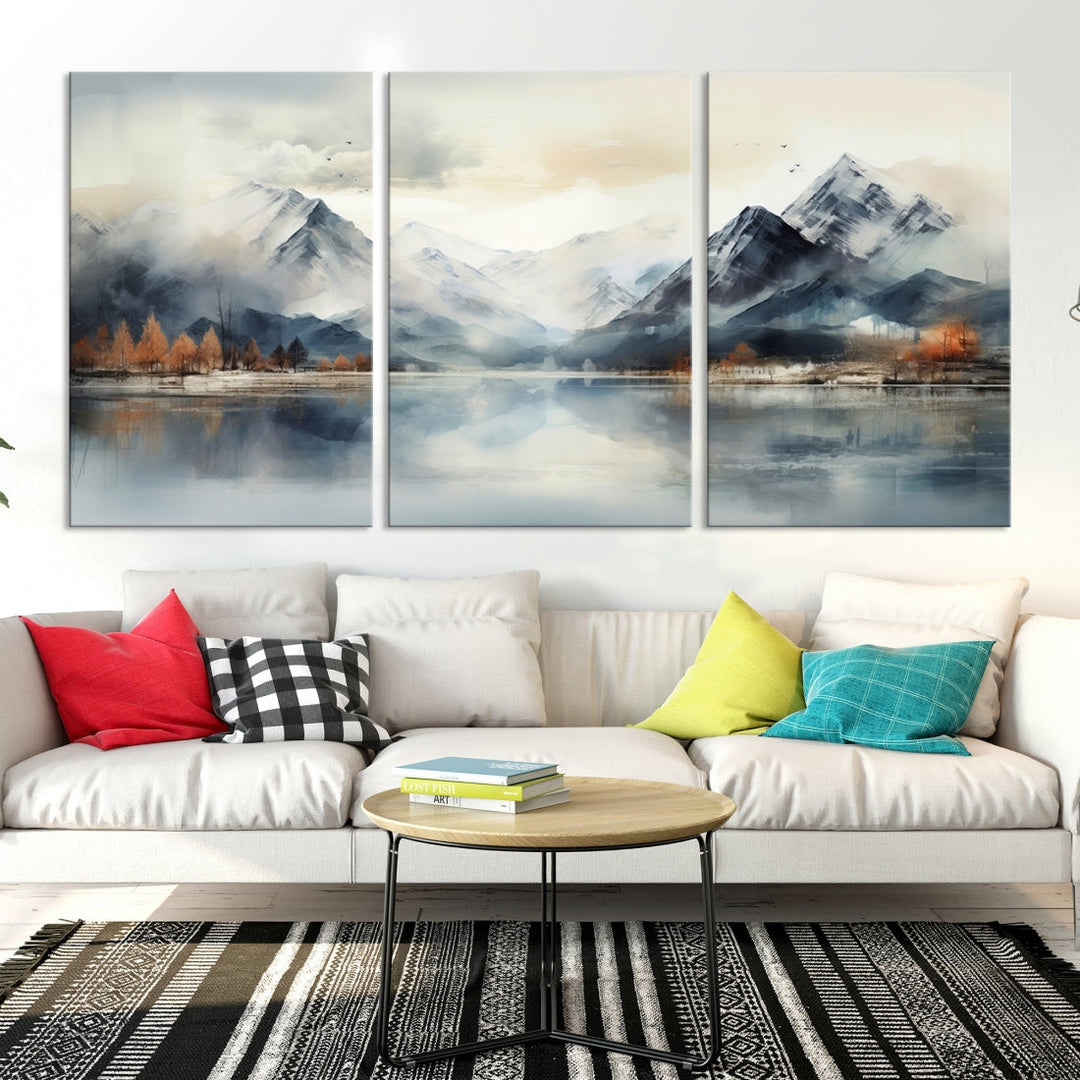 The Lake Mountain Abstract Wall Art, featuring a serene portrayal of mountains and a tranquil lake with autumn trees, is displayed on museum-quality canvas and enhanced by UV-protective coating.