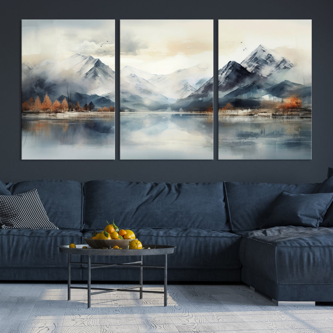 The Lake Mountain Abstract Wall Art, featuring a serene portrayal of mountains and a tranquil lake with autumn trees, is displayed on museum-quality canvas and enhanced by UV-protective coating.