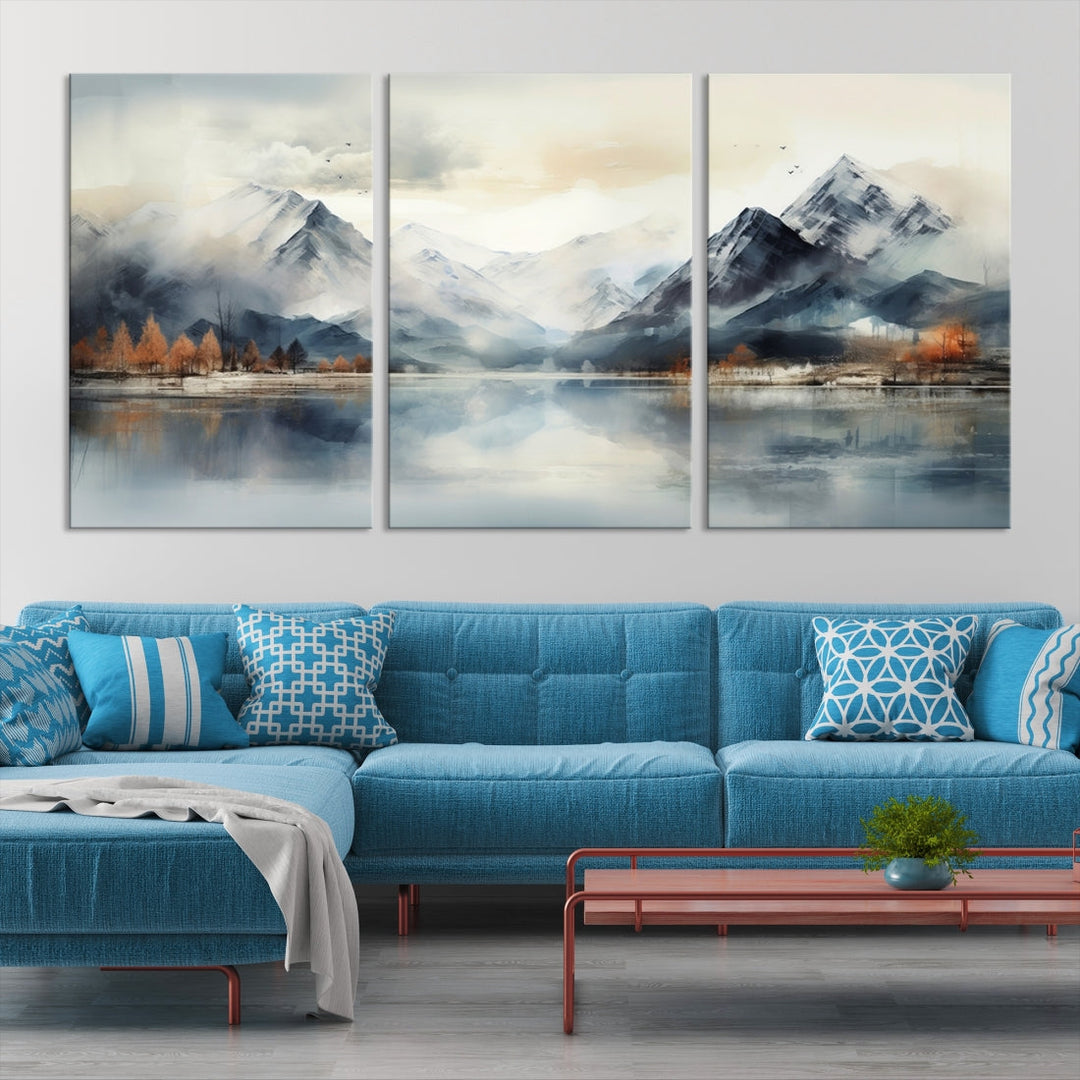 The Lake Mountain Abstract Wall Art, featuring a serene portrayal of mountains and a tranquil lake with autumn trees, is displayed on museum-quality canvas and enhanced by UV-protective coating.