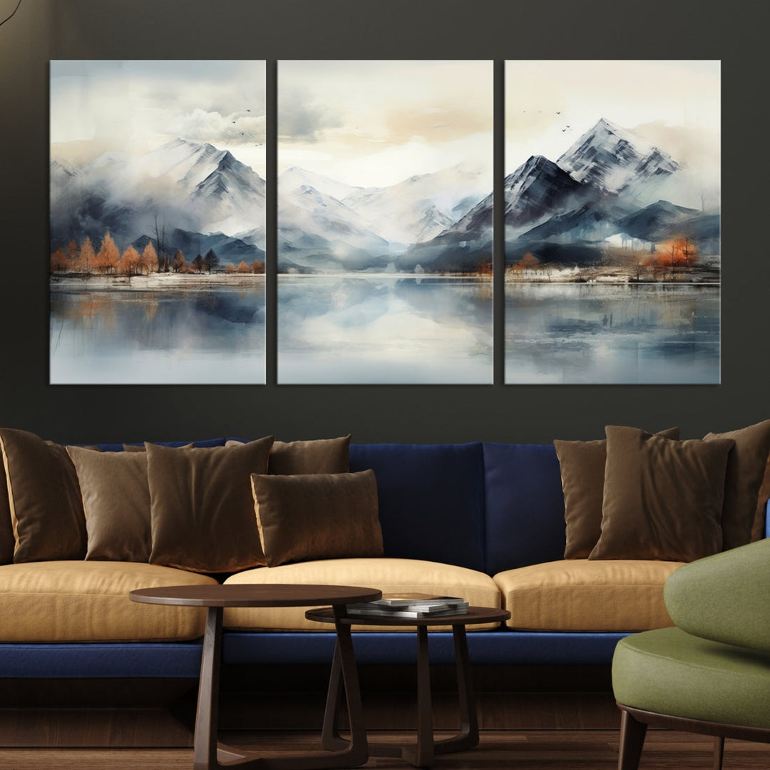 The Lake Mountain Abstract Wall Art, featuring a serene portrayal of mountains and a tranquil lake with autumn trees, is displayed on museum-quality canvas and enhanced by UV-protective coating.