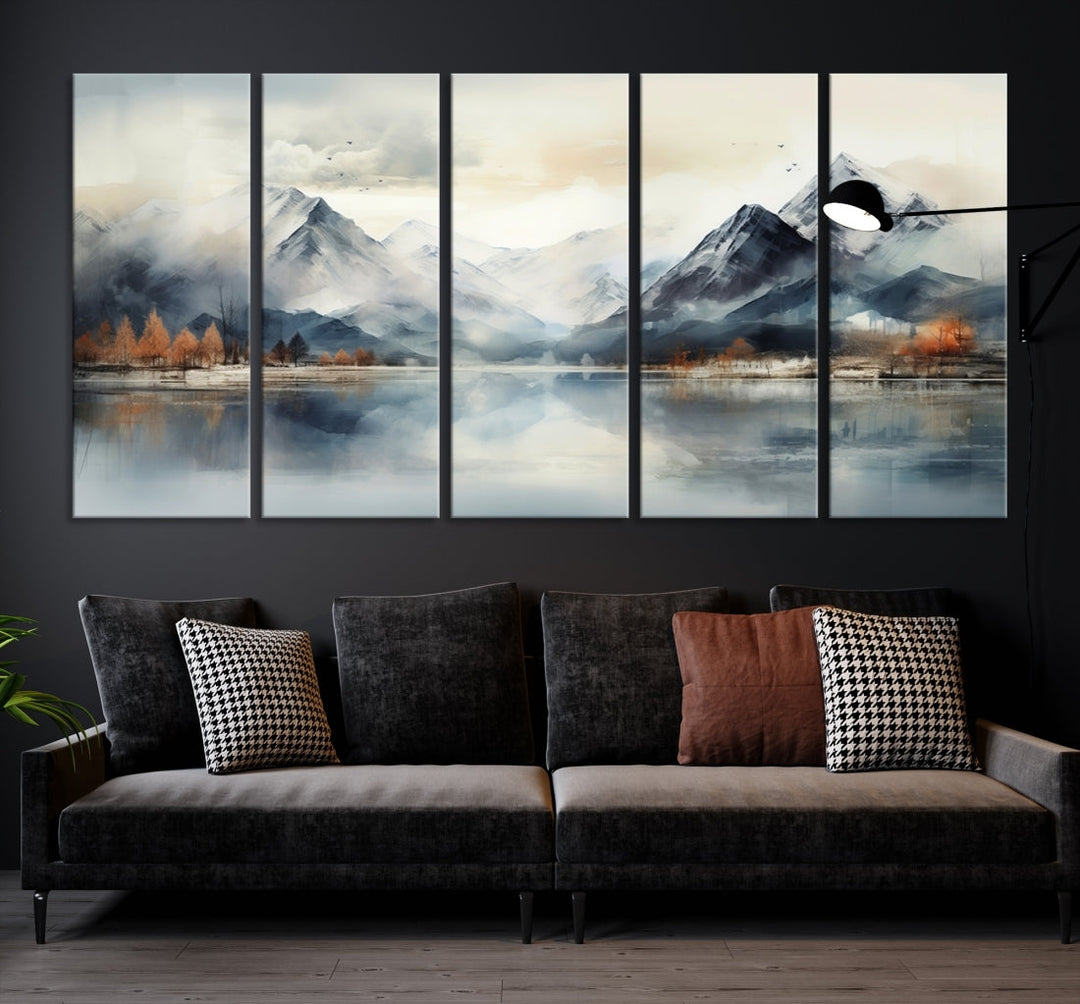 The Lake Mountain Abstract Wall Art, featuring a serene portrayal of mountains and a tranquil lake with autumn trees, is displayed on museum-quality canvas and enhanced by UV-protective coating.