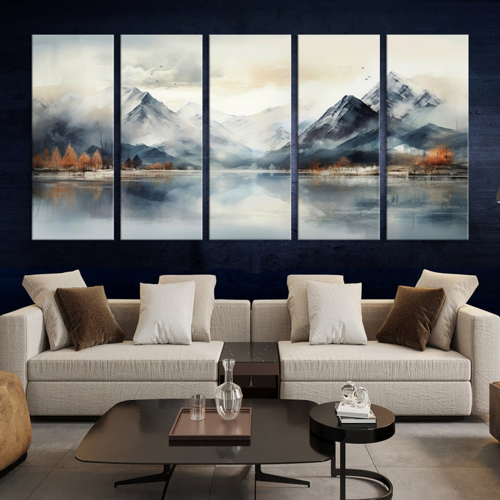 The Lake Mountain Abstract Wall Art, featuring a serene portrayal of mountains and a tranquil lake with autumn trees, is displayed on museum-quality canvas and enhanced by UV-protective coating.