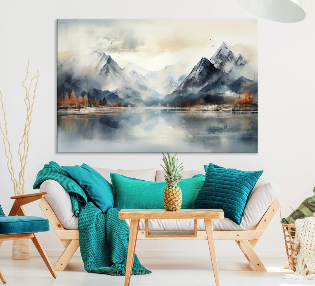 The Lake Mountain Abstract Wall Art, featuring a serene portrayal of mountains and a tranquil lake with autumn trees, is displayed on museum-quality canvas and enhanced by UV-protective coating.