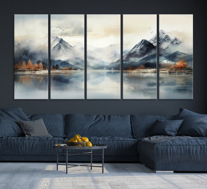 The Lake Mountain Abstract Wall Art, featuring a serene portrayal of mountains and a tranquil lake with autumn trees, is displayed on museum-quality canvas and enhanced by UV-protective coating.