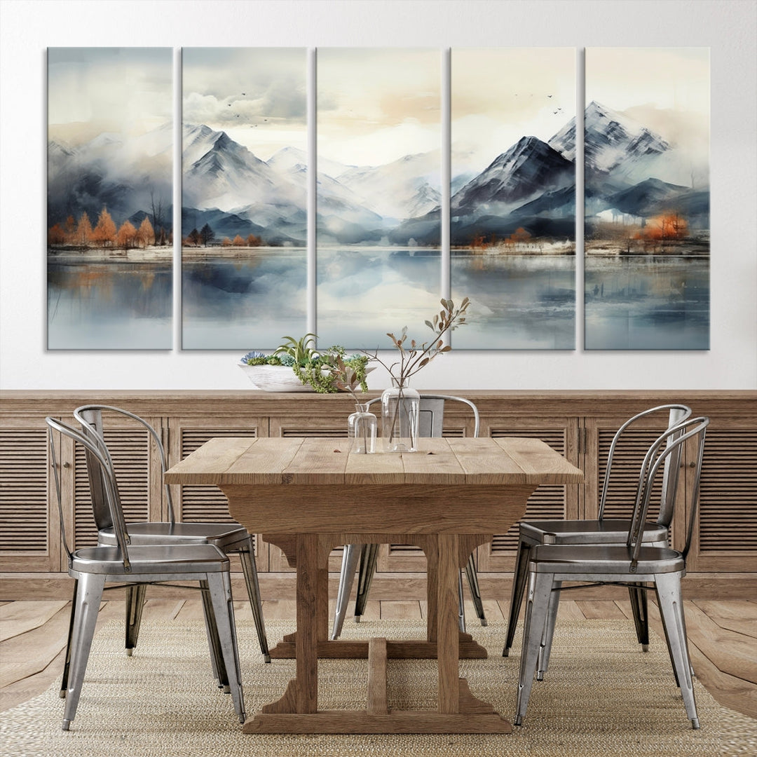 The Lake Mountain Abstract Wall Art, featuring a serene portrayal of mountains and a tranquil lake with autumn trees, is displayed on museum-quality canvas and enhanced by UV-protective coating.