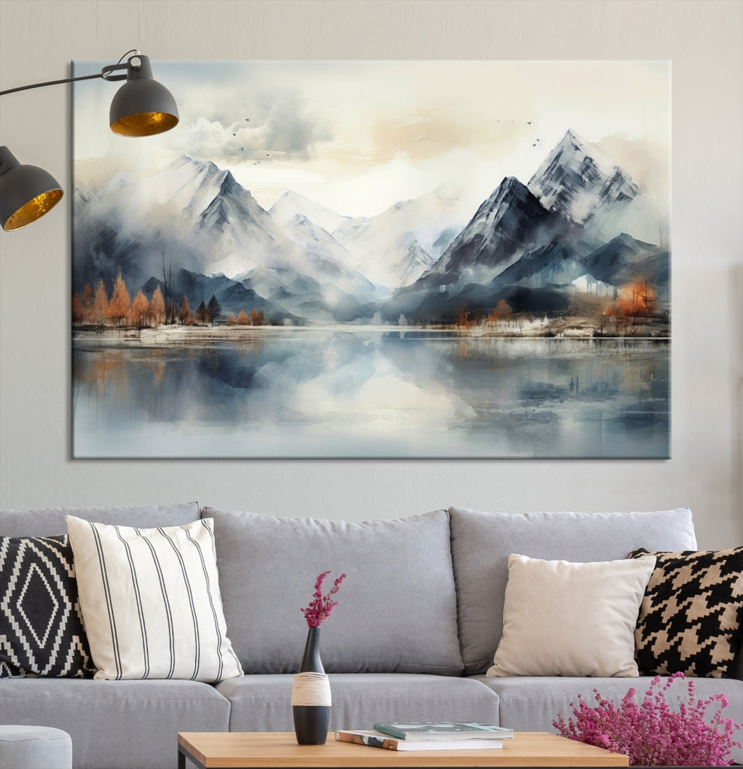 The Lake Mountain Abstract Wall Art, featuring a serene portrayal of mountains and a tranquil lake with autumn trees, is displayed on museum-quality canvas and enhanced by UV-protective coating.