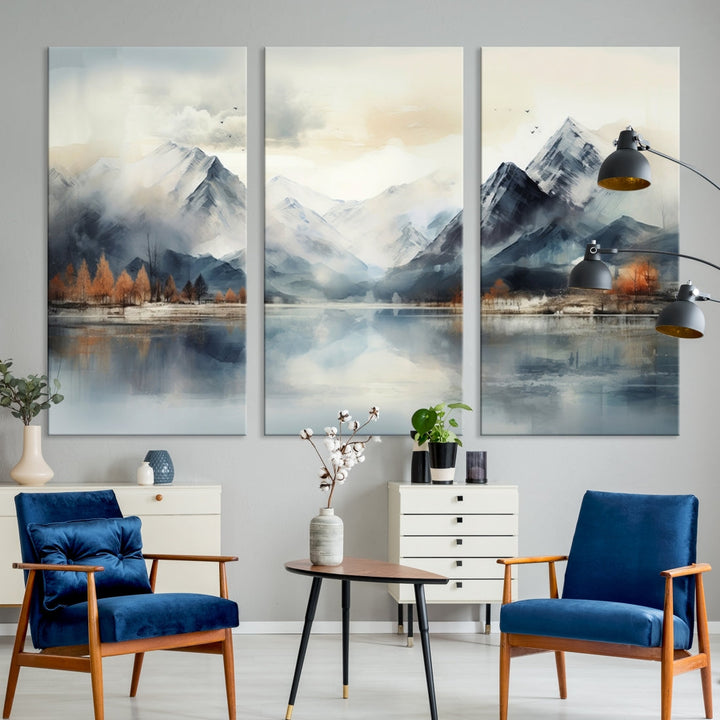 The Lake Mountain Abstract Wall Art, featuring a serene portrayal of mountains and a tranquil lake with autumn trees, is displayed on museum-quality canvas and enhanced by UV-protective coating.