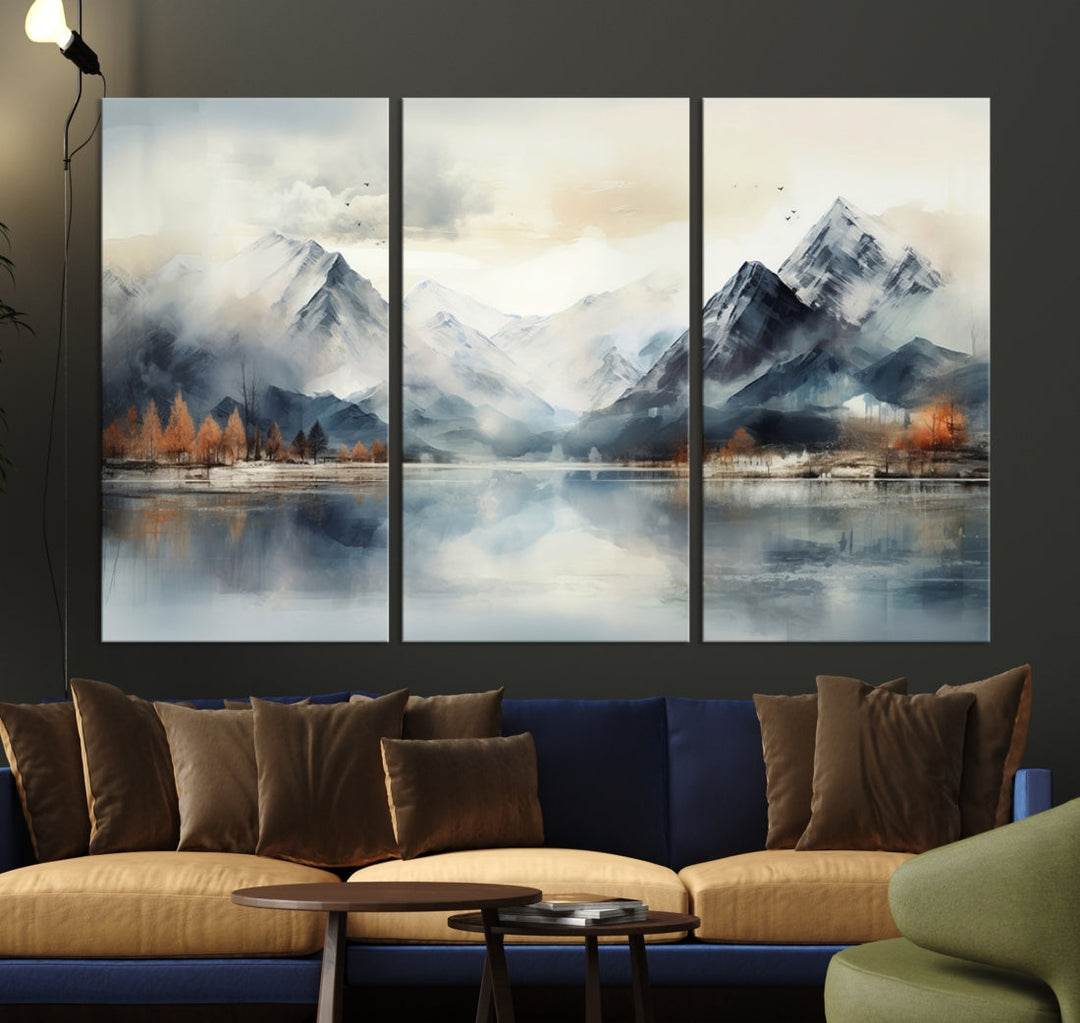 The Lake Mountain Abstract Wall Art, featuring a serene portrayal of mountains and a tranquil lake with autumn trees, is displayed on museum-quality canvas and enhanced by UV-protective coating.