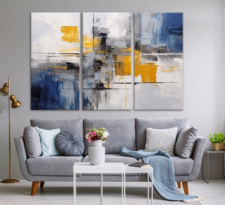 This Large Abstract Contemporary Art Canvas, skillfully crafted by a professional artisan on museum-quality material, showcases shades of blue, yellow, and gray.