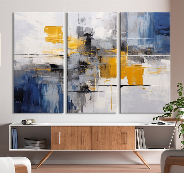 This Large Abstract Contemporary Art Canvas, skillfully crafted by a professional artisan on museum-quality material, showcases shades of blue, yellow, and gray.